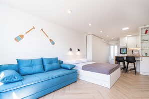 Apartment | Wohnbereich | 30-Zoll-Fernseher mit Digitalempfang