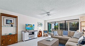 Condo (Sandpebble 2B) | Living room | Flat-screen TV - Sandpebble 2B (Sanibel)