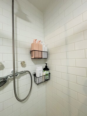 Shower, hair dryer, towels, soap