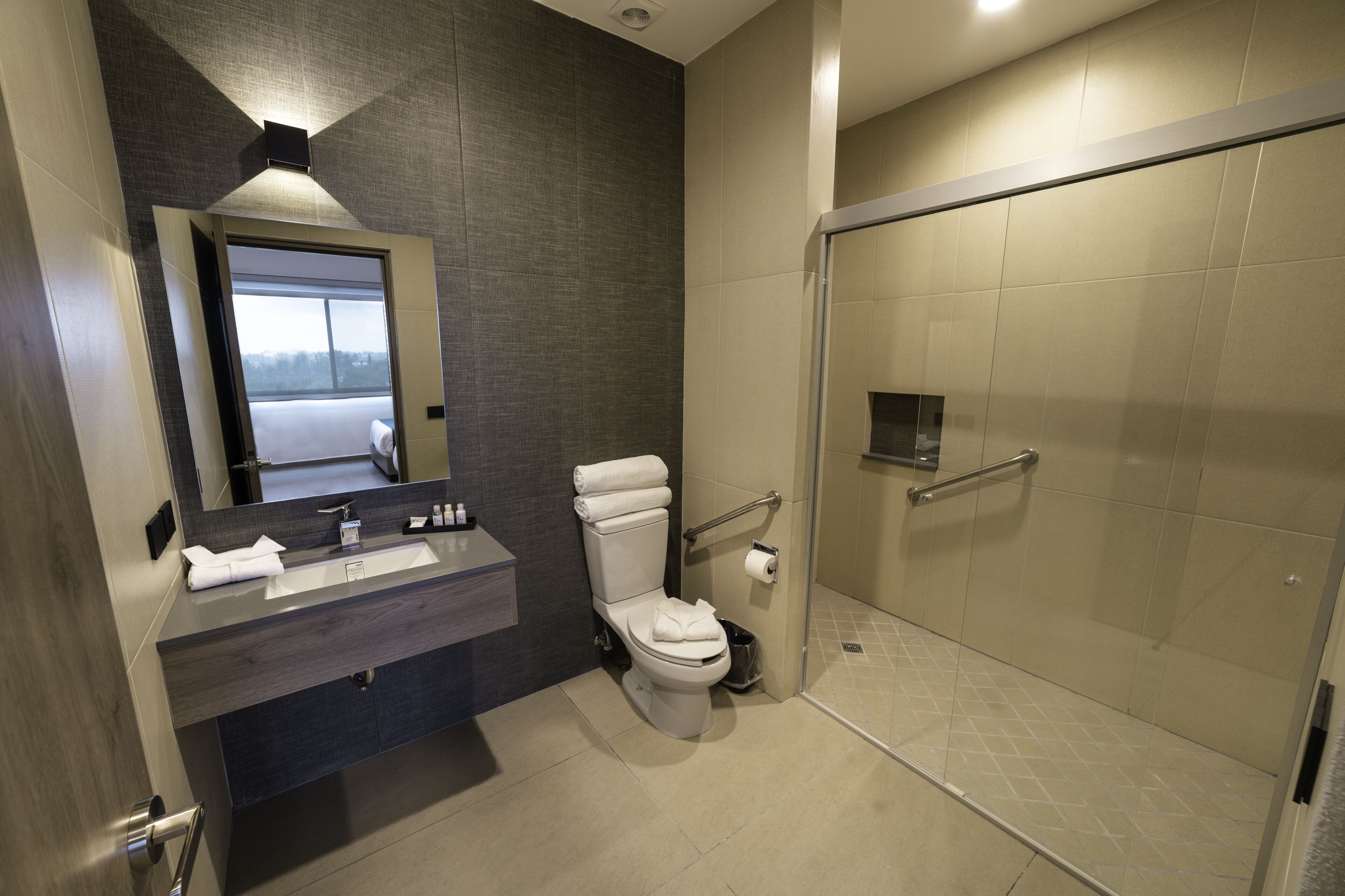 junior double room, accessible | bathroom | shower, hair dryer, towels, soap