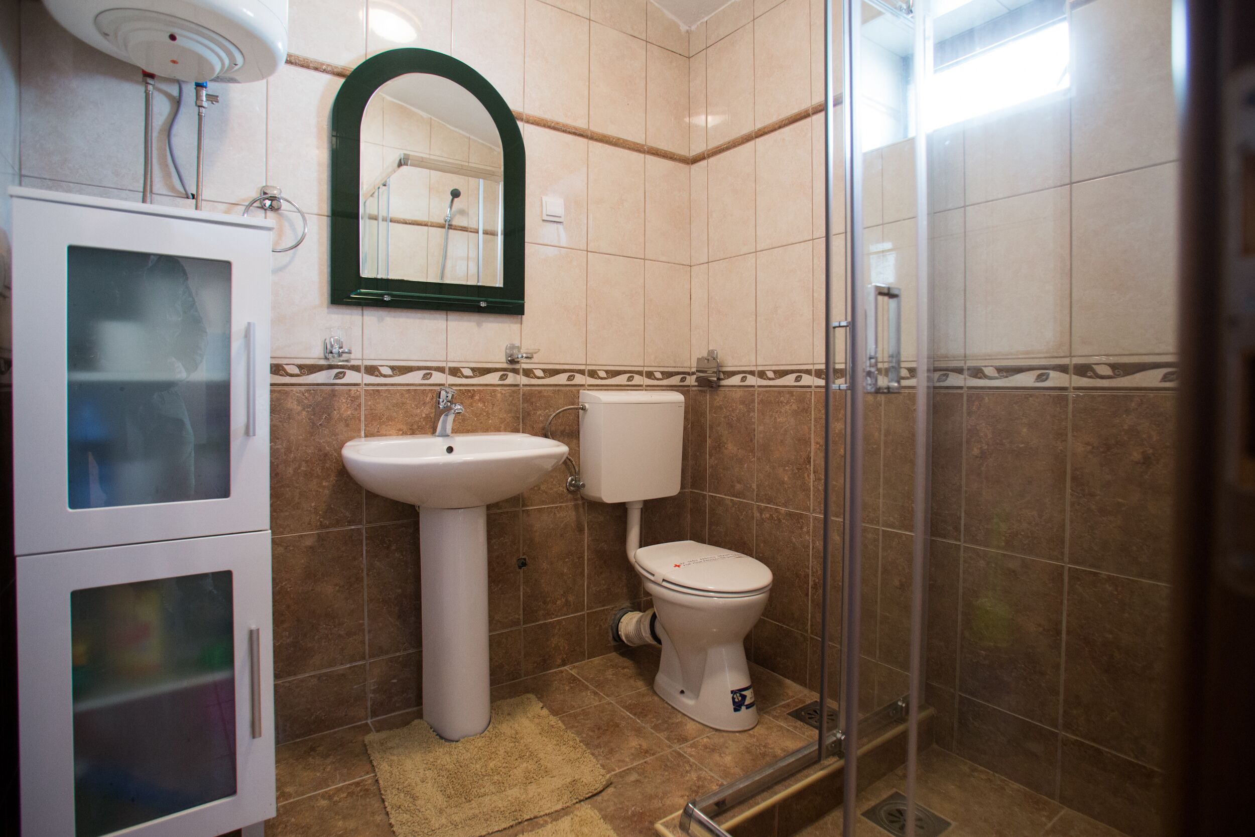 Bathtub, hair dryer, towels, soap