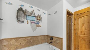 Shower, jetted tub, hair dryer, towels