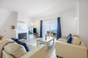 TV, books - CoolHouses Algarve Luz , 2 Bed apartment w/ sea view, Blue Ocean View (Luz)