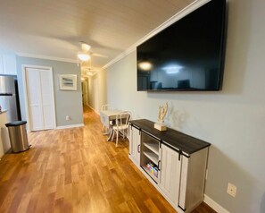 Enjoy cooking in this well-equipped kitchen with a large flat-screen TV and dining area.