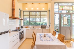 Apartment | Private kitchenette | Fridge, microwave, oven, stovetop
