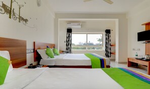 Deluxe Room | Individually furnished, blackout curtains, iron/ironing board - Treebo Atithi Comforts, 1 Km From Nisargadhama Forest (Somvarpet)