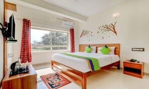 Deluxe Room | Individually furnished, blackout curtains, iron/ironing board - Treebo Atithi Comforts, 1 Km From Nisargadhama Forest (Somvarpet)