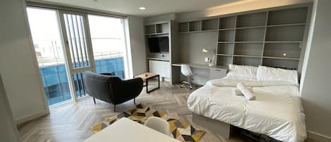 Desk, laptop workspace, free WiFi, bed sheets