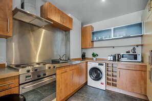 Fridge, microwave, stovetop, dishwasher - Contemporary One Bedroom Apartment in City Road, London by MySquare (London)