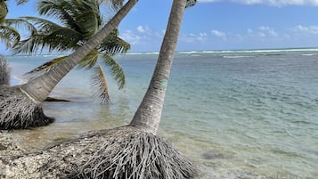 On the beach, sun-loungers, beach towels