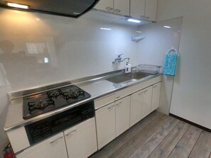 Fridge, microwave, stovetop, cookware/dishes/utensils