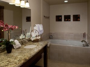 Bathtub, jetted bath, hair dryer, towels