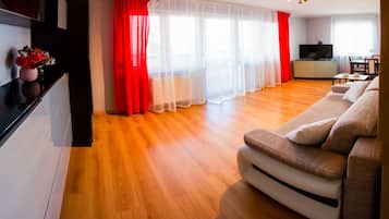 Classic Apartment | Living area | Flat-screen TV