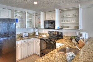Fridge, microwave, dining tables