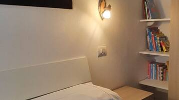 2 bedrooms, desk, iron/ironing board, travel crib