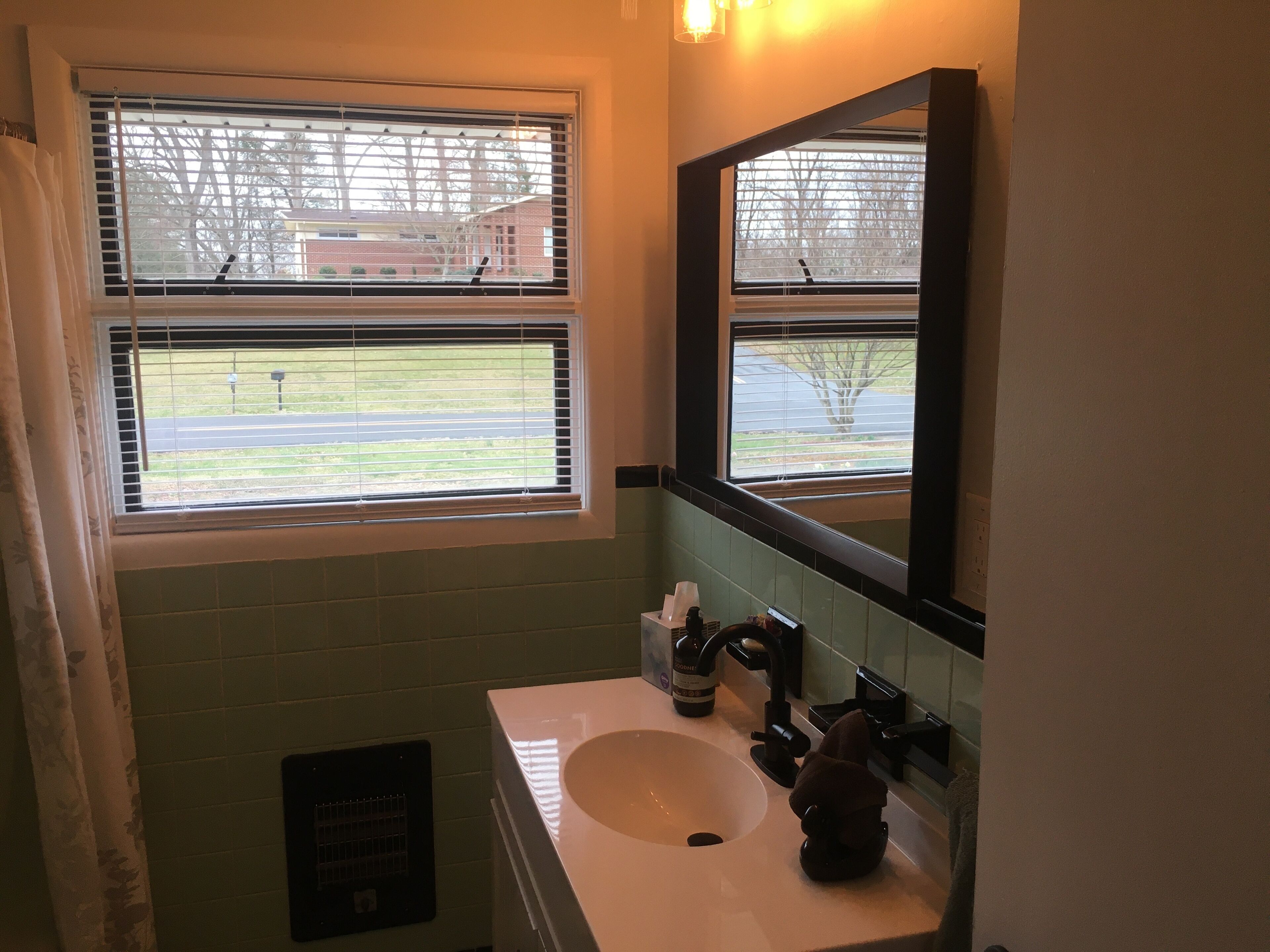 Bathtub, hair dryer, towels, soap