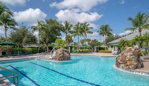 A heated pool, pool loungers