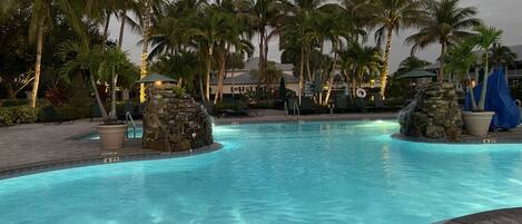 A heated pool, sun loungers