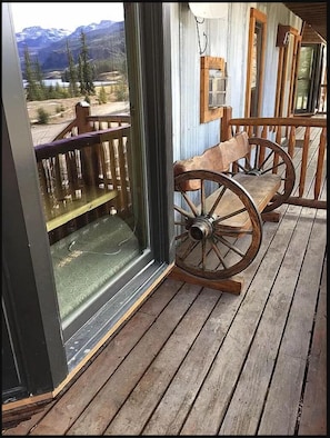 Relax on the porch with a view of the surrounding mountains.