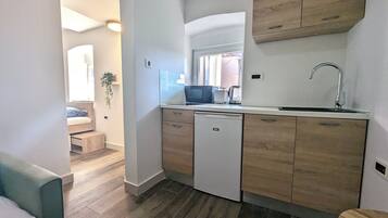 1 chambre, fer et planche Ă repasser, Wi-Fi gratuit, draps fournis