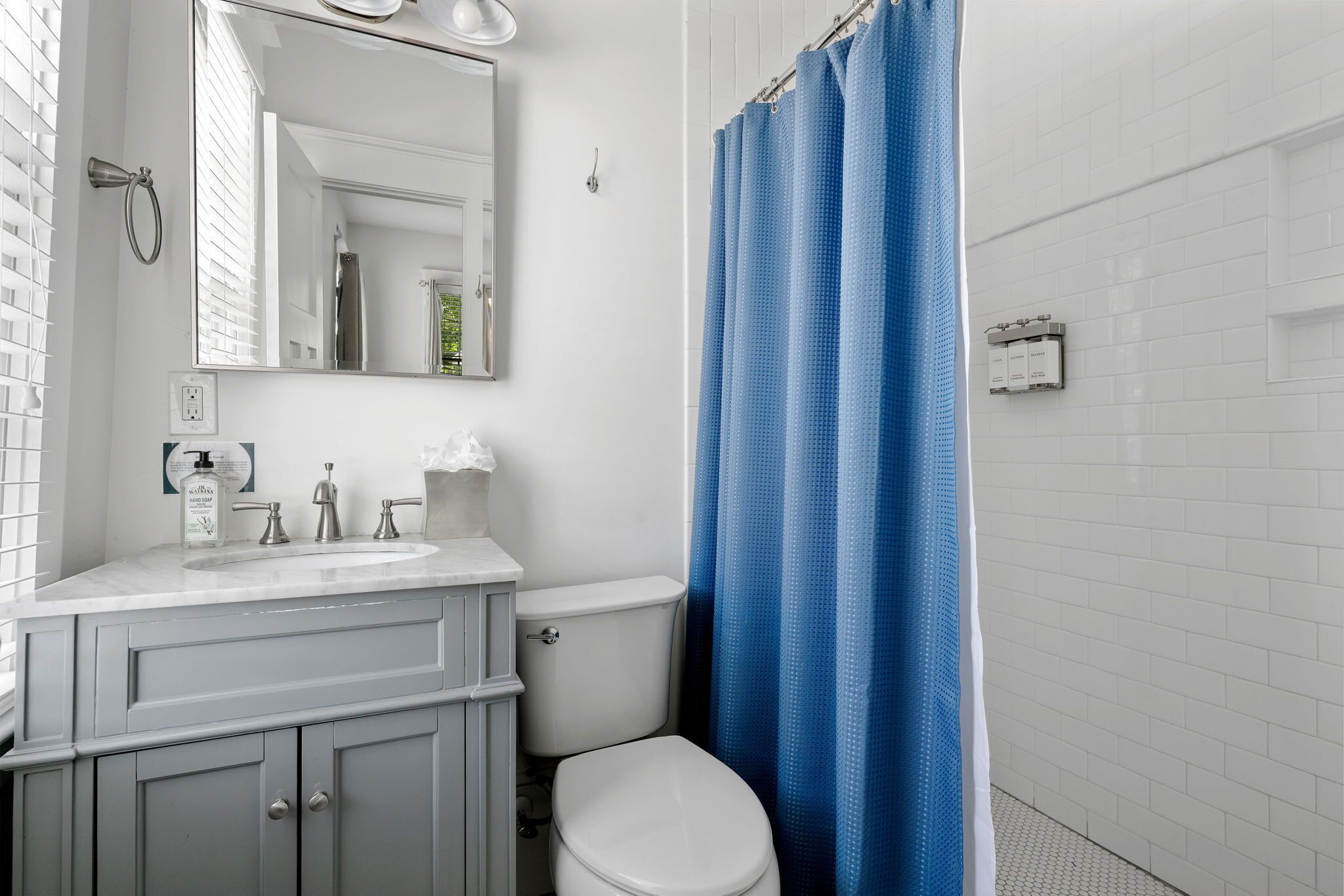 Shower, hair dryer, towels, shampoo