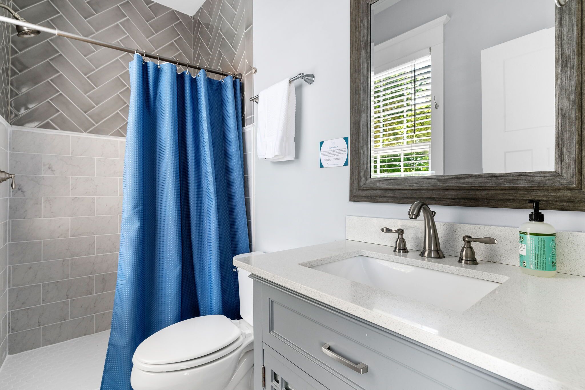 Shower, hair dryer, towels, shampoo