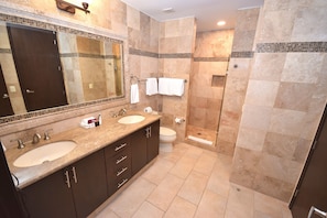 Bathtub, hair dryer, towels, soap