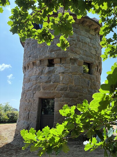 Mill overlooking the sea and the Breton countryside