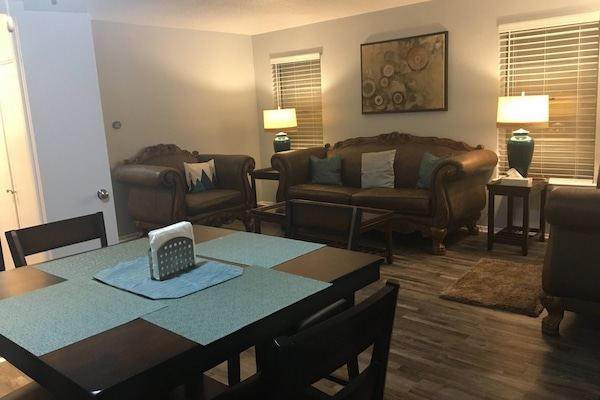 Adjacent dining area in open floor plan.