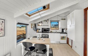 Fridge, stovetop, dishwasher, coffee/tea maker