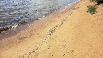 On the beach, sun loungers, beach towels