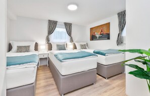 2 habitaciones, cuna de viaje, wifi gratis y ropa de cama 