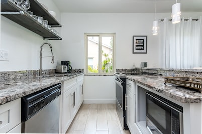 Quaint Luxury 1/1 Villa with HEATED Pool-BEST LOCATION- walk to everything!