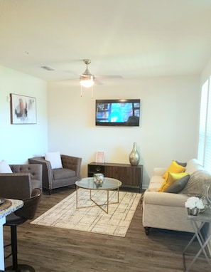 Living Room with 50in SmartTV. Roku included with streaming channels.