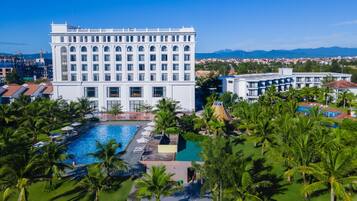 2 outdoor pools, open 6:00 AM to 7:00 PM, pool umbrellas, sun loungers