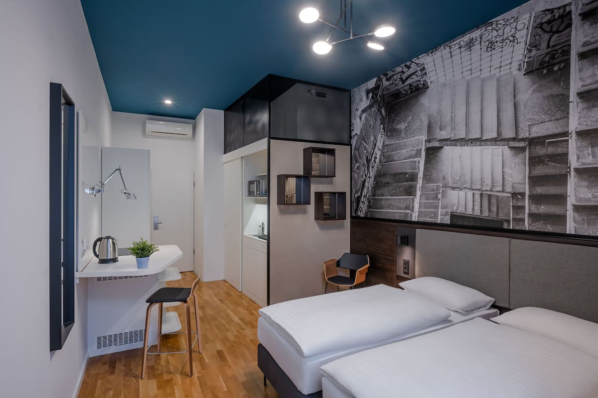 Chambre supĂ©rieure avec lits jumeaux | Coffre-fort, rideaux dâobscurcissement, systĂšme dâinsonorisation