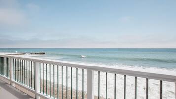 On the beach, sun-loungers, beach towels