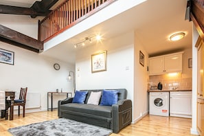 Standard Apartment, City View | Living area | 42-inch Smart TV with satellite channels, TV