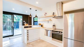 Fridge, dishwasher, toaster, cookware/dishes/utensils