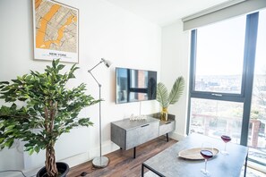 Apartamento standard | Área de estar | Smart TV