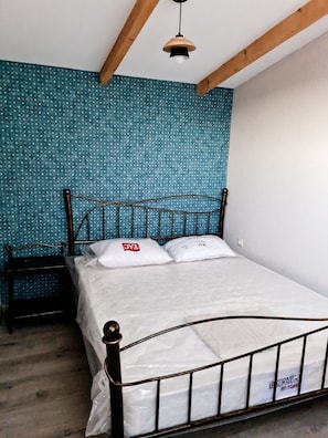 2 dormitorios, tabla de planchar con plancha, wifi gratis y ropa de cama