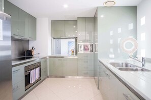 Fridge, microwave, oven, stovetop - Live Like a Local in the Heart of Moffat Beach (Moffat Beach)