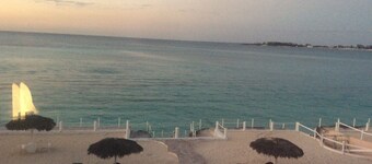 Beach front apartment with garden and direct access to a private   beach and