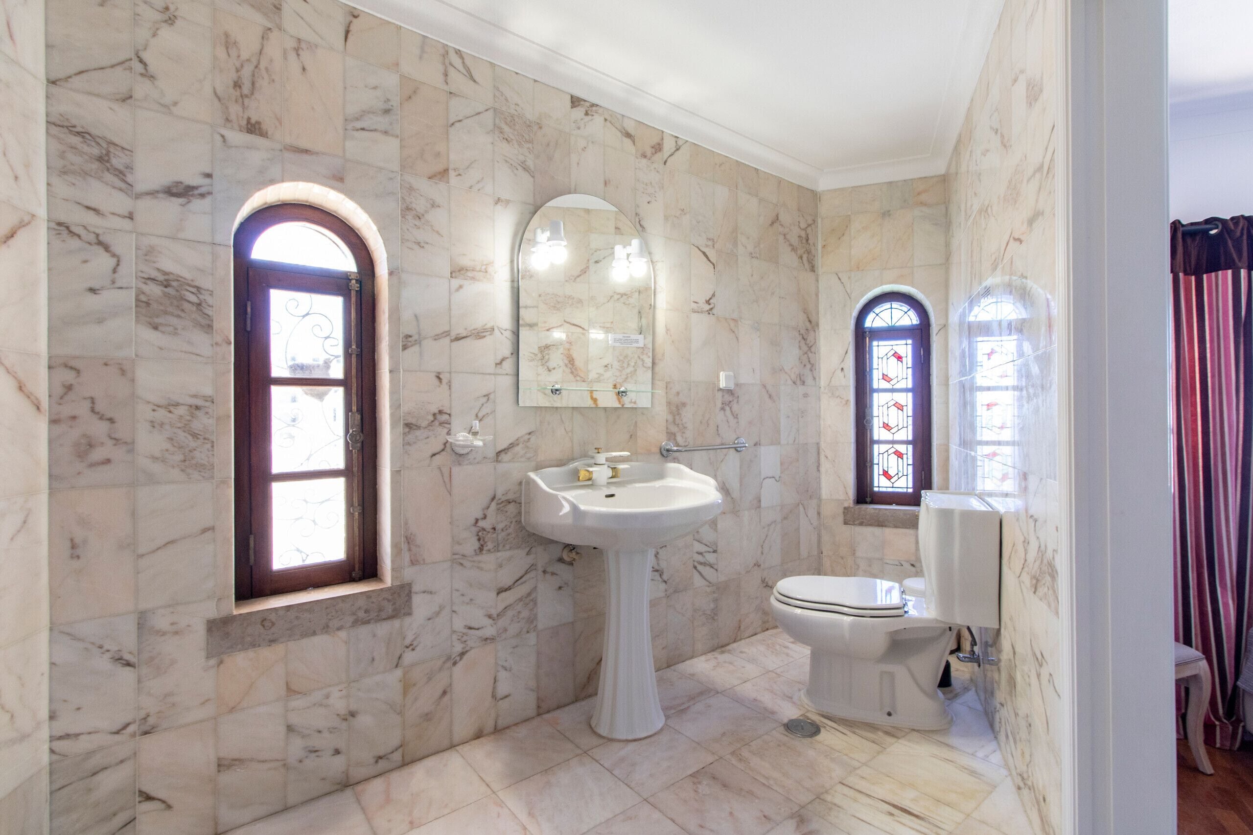 Bathtub, hair dryer, towels