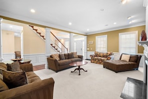 TV, fireplace, books, offices