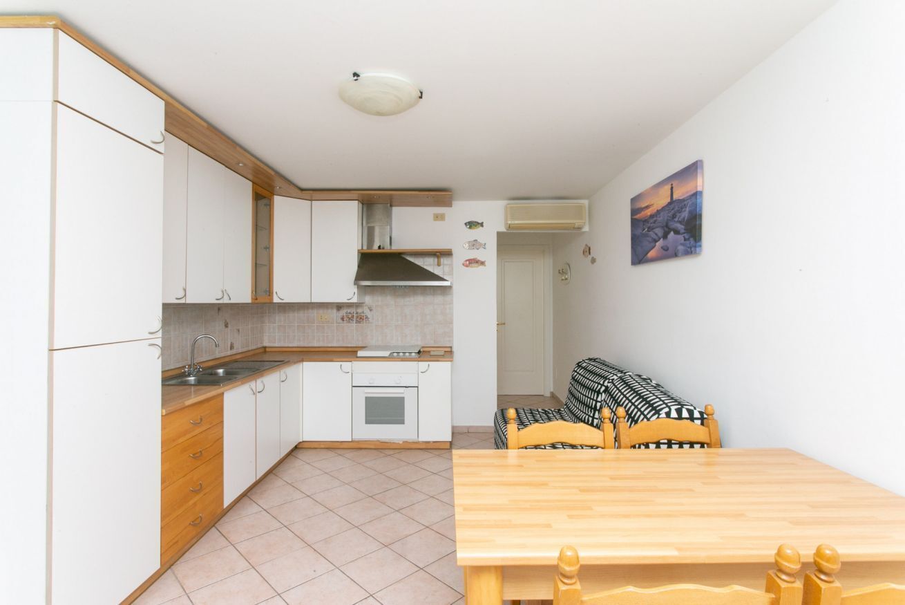 Fridge, oven, freezer, dining table