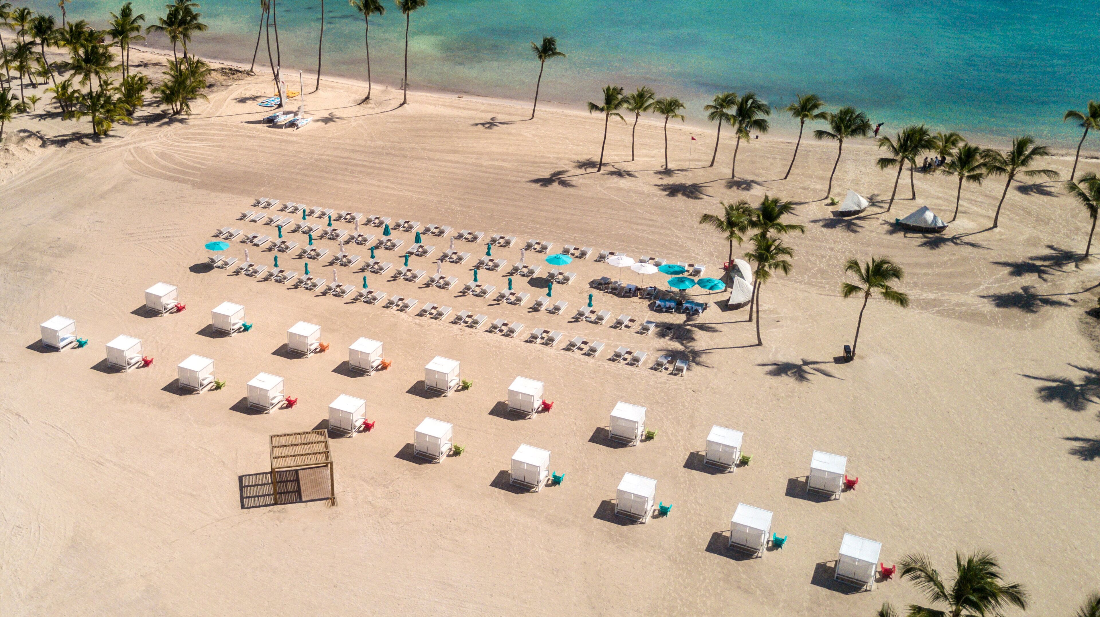 Private beach, white sand, sun loungers, beach umbrellas