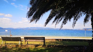 On the beach, sun-loungers, beach towels
