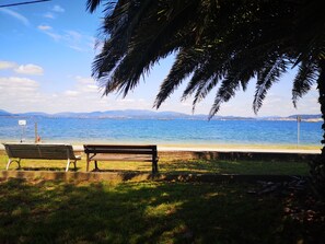 On the beach, sun loungers, beach towels