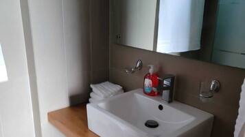 Hair dryer, towels, soap, toilet paper